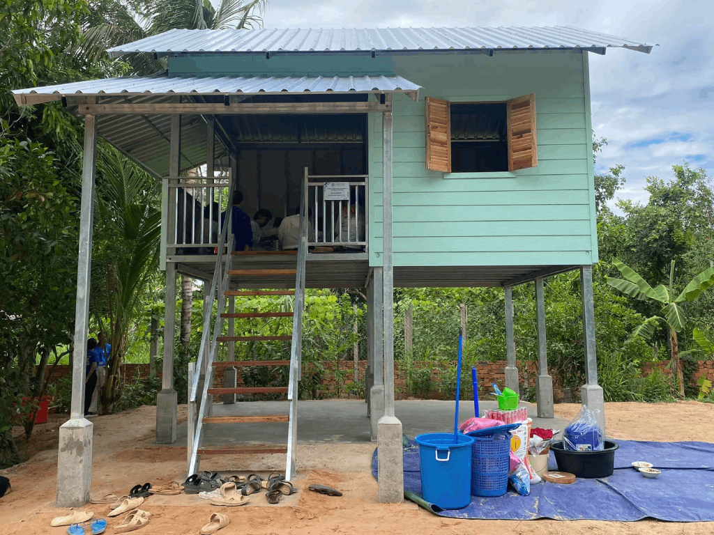 A Hutt on stilts, required to keep predators and water out of the family homes in Cambodia